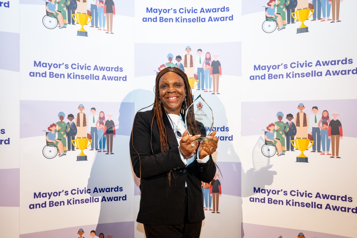 Diane Brade, recipient of the Mayor's Civic Award on behalf of her late father George Brade