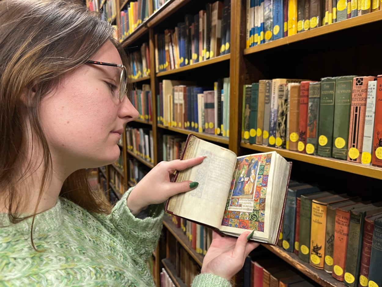 The Book of Hours: Library and digital assistant Alex Brummitt with The Book of Hours at Leeds Central Library.
Penned in around 1480 and inscribed on delicate vellum, the Horae beatae Mariae Virginis, or Book of Hours, contains forty-six vividly illuminated images depicting various duties to be carried out each month along with the signs of the zodiac.