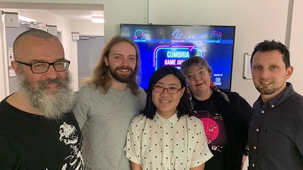 (l-r) University of Cumbria GameJam 2023: keynote speaker and judging panel member Dr Ian Sturrock, winners Charlie Anderson and Suki Shek, and university Game Design lecturers Nimue Von-Lind and Lucian Toma
