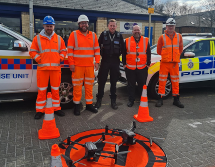 An image of a British Transport Police officer with Northern and Network Rail staff involved in the crackdown on trespassing in the North East