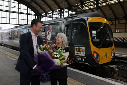 Chris Nutton, Major Projects Director at TPE and Elaine Roberts, Andy's mum and co-founder of Andy's Man Club with the new TPE train