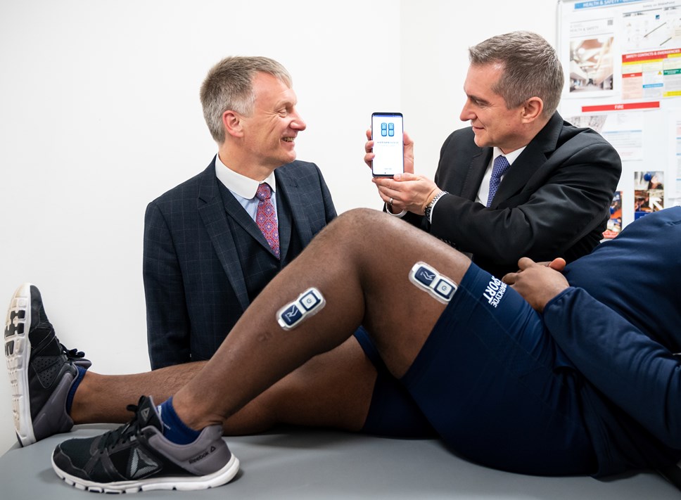 (L-R) Minister for Trade, Investment and Innovation Ivan McKee and EnMovi CEO Roman Bensen