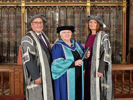 Left-right: University of Cumbria Deputy Vice Chancellor (Health, Environment and Innovation) Professor Brian Webster-Henderson with Professor Kath McCourt CBE FRCN, university Honorary Doctorate recipient, and university Vice Chancellor Professor Julie Mennell, pictured in the Border Regiment Chape