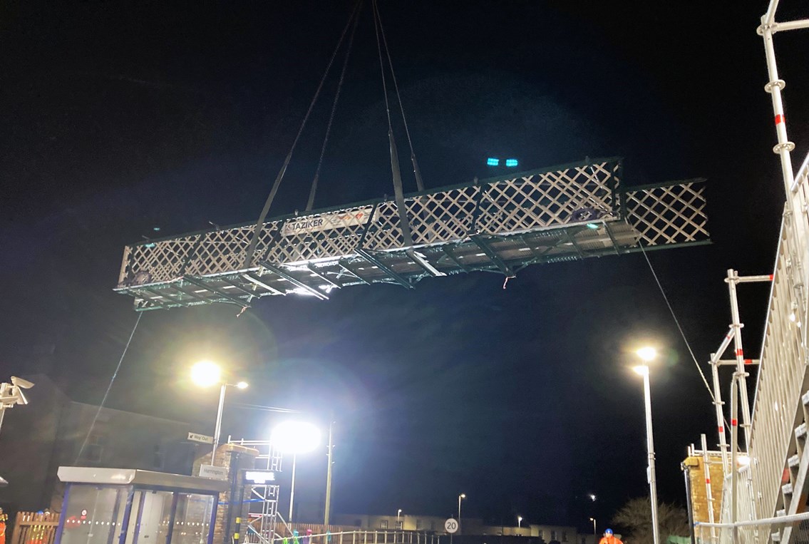 Refurbished Harrington station footbridge being craned into position on Saturday 4 March 2023