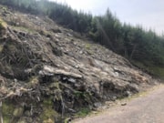 A large landslide in Gleann Mor near Lochgoilhead posed a potential rockfall risk to road users.: A large landslide in Gleann Mor near Lochgoilhead posed a potential rockfall risk to road users.