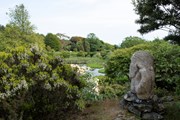 HES - Glenwhan Gardens, view looking east across the Lily Pond from Hideout Rock with The Listener sculpture: HES - Glenwhan Gardens, view looking east across the Lily Pond from Hideout Rock with The Listener sculpture
