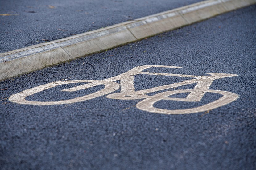 Leeds pedals out bid for public e-bike ambition: Bike sign on segregated cycle lane