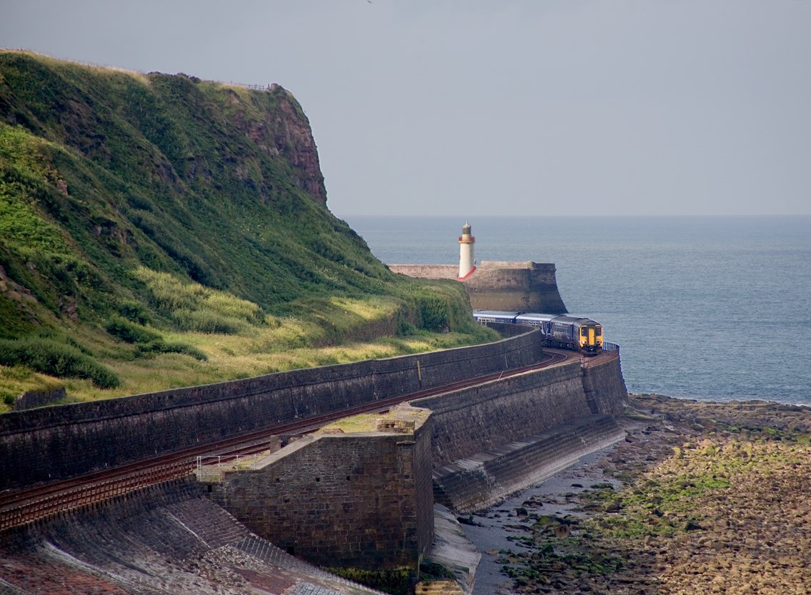 Cumbrian coast line near Whitehaven: Trains operated by Northern on the Carlisle to Barrow line.