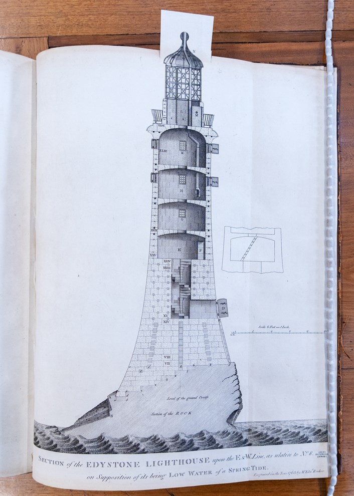 Engineery: Pages from the book containing original plans for John Smeaton's famous Eddystone Lighthouse. The beautiful first edition, penned by Smeaton himself, is on loan from Leeds Central Library, and is among the fascinating objects featured in Engineery, a new exhibition which has opened at Leeds Industrial Museum. Image credit: Anthony Robling.