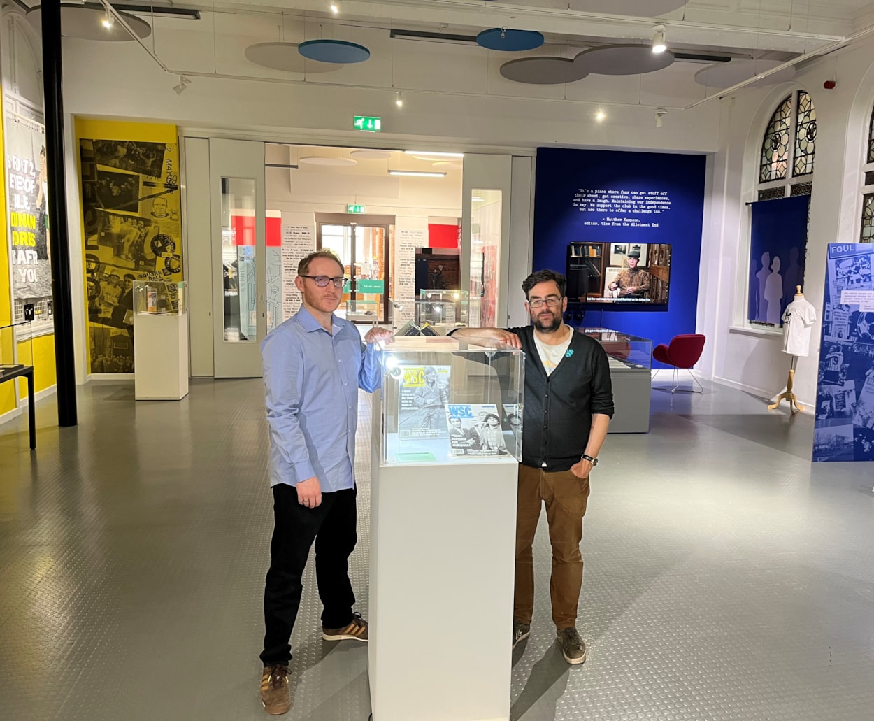 Voice of the Fans: Kenn Taylor (L), lead culture producer north at the British Library, and Antony Ramm, librarian at Leeds Central Library with some of the magazines created by football supporters, is among the scores of titles which feature in Voice of the Fans.