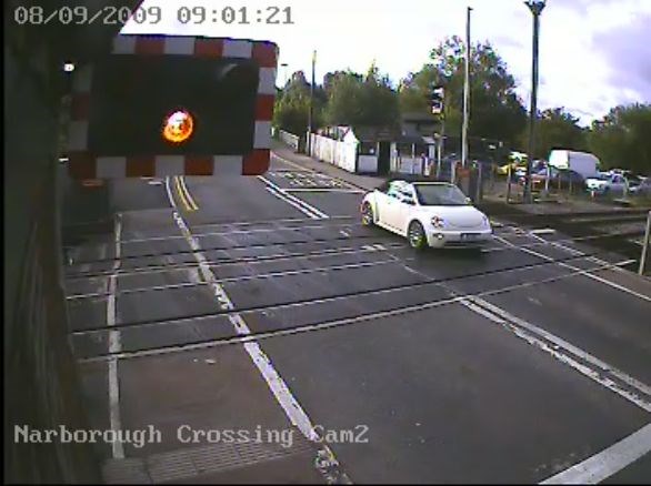 Motorist ignores warning lights at Narborough level crossing, Leicester (1): Motorist ignores warning lights at Narborough level crossing, Leicester (1)