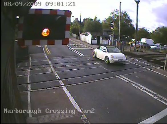 Motorist ignores warning lights at Narborough level crossing, Leicester (1)