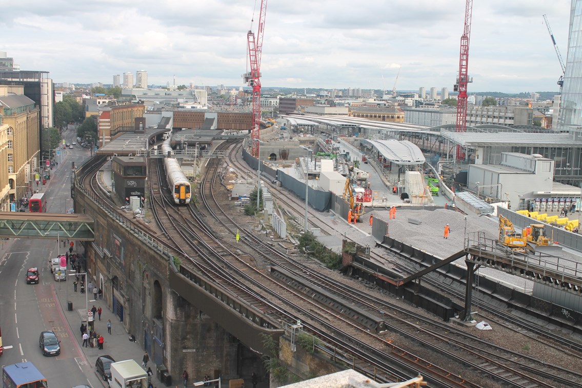Ballast is laid on the approach to the new Borough Market viaduct: The first ballast is laid on the approach to Borough viaduct this week (September 12 and 13) by the Thameslink Programme, with London Bridge growing in the background. A Cannon St train runs through platform 3.