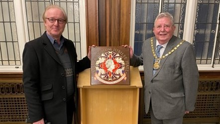 Header - County Councillor Peter Britcliffe, Chairman of the county council and Robin Utrack who designed the Platinum Jubilee Hall plaque