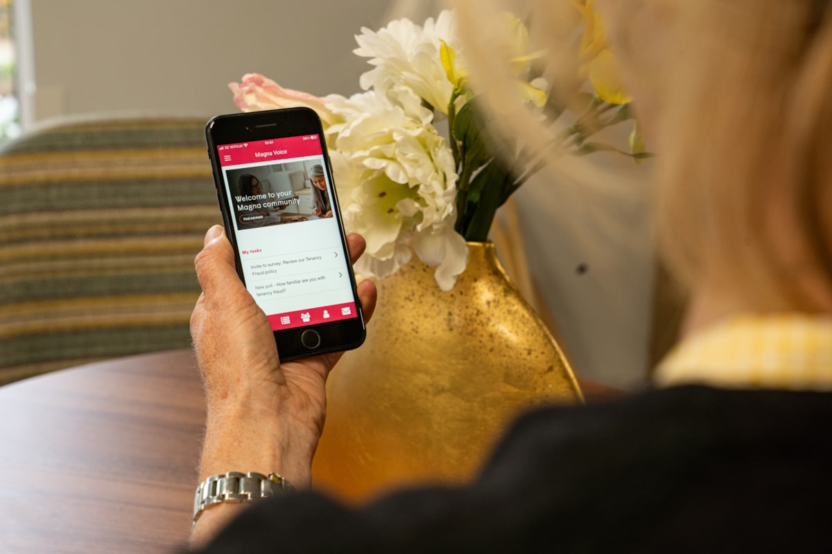 person signing into magna voice app