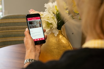 person signing into magna voice app