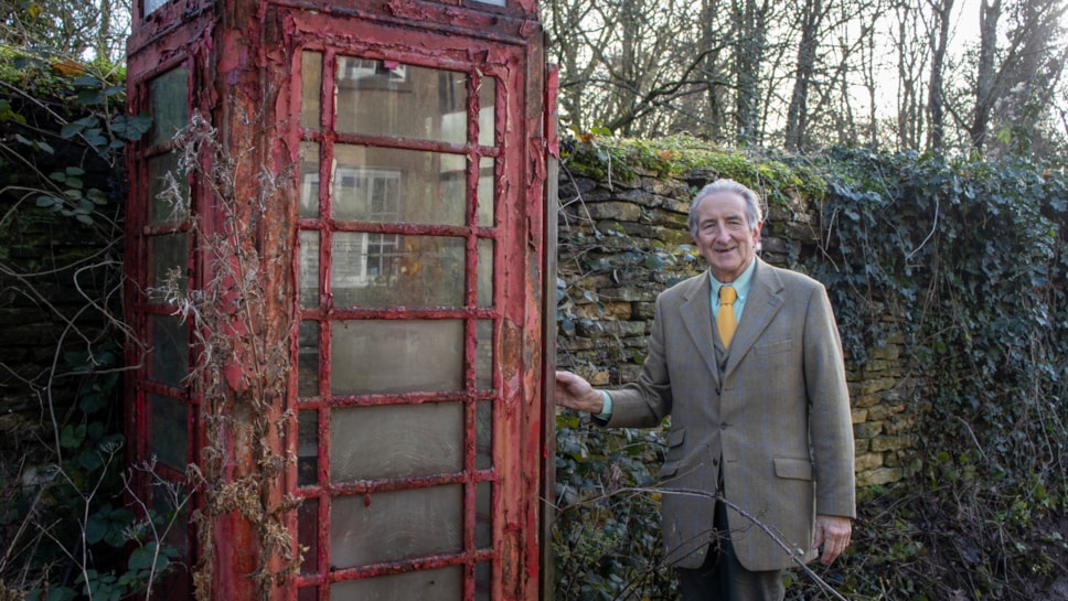 Patrick Coleman by disused phone box in Rodmarton