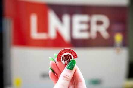 LNER Pet Champion Pin Badge in front of LNER Azuma Train