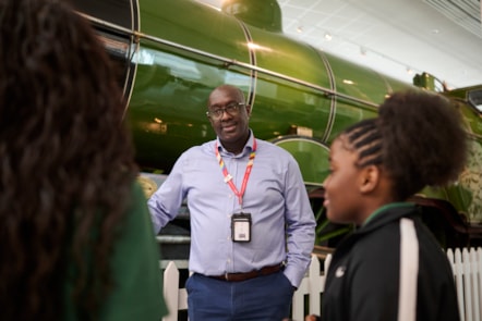 LNER colleague talking next to train