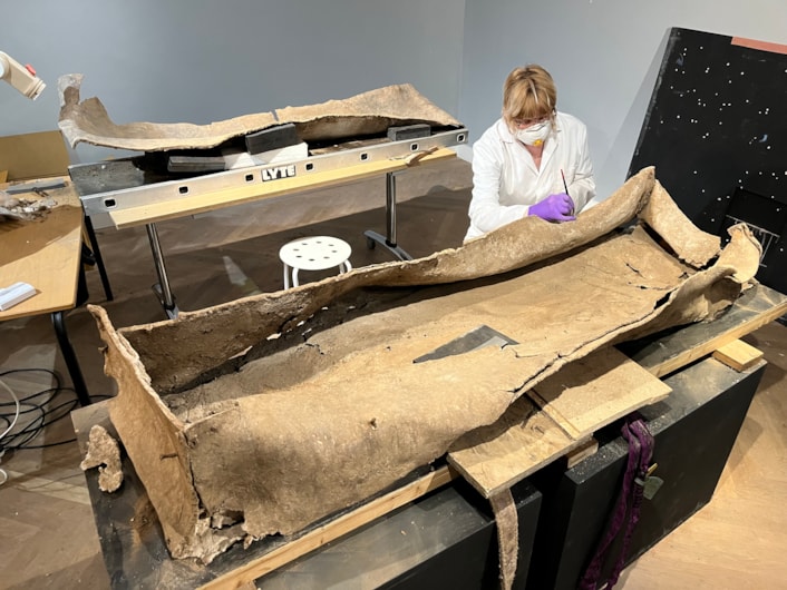 Living with Death coffin display: Emma Bowron, conservator with Leeds Museums and Galleries, works on the ancient lead coffin which lay buried in a Leeds field for more than 1,600 years.
The astonishing discovery, described by experts as a once-in-a-lifetime find, was made during excavation work by West Yorkshire Archaeological Services in a previously unknown site near Garforth.
It will go on display at Leeds City Museum in May as part of a new exhibition called Living with Death.