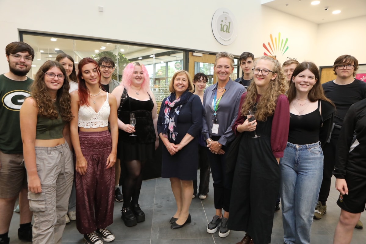 Lynne Neagle cabinet secretary for education congratulates some of the successful students during her visit to the Yale campus, Wrexham