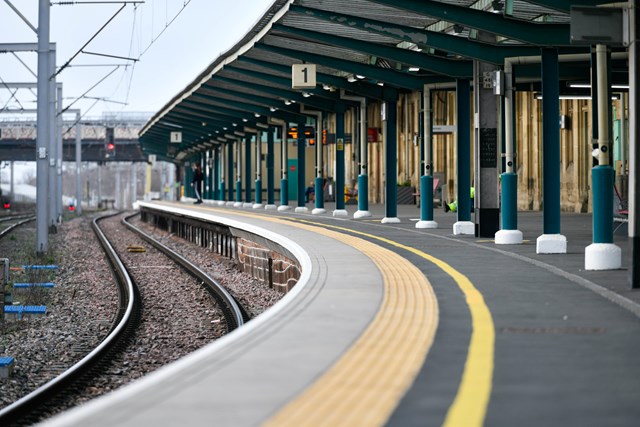 Empty platform at Carlisle station showing new surfacing including tactile paving