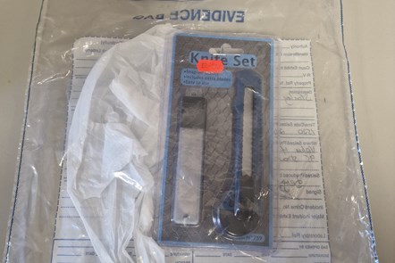 Craft knife in plastic evidence bag