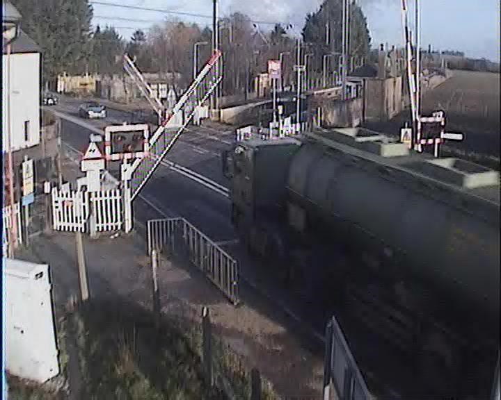 Tanker driver runs the risk at Foxton crossing, Cambs (2): Tanker driver runs the risk at Foxton crossing, Cambs (2)