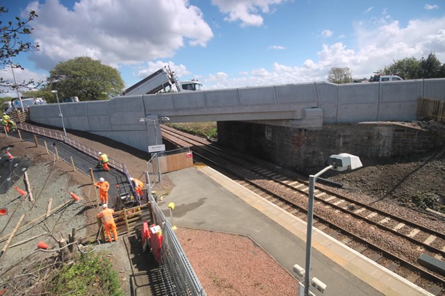 Resurfacing new railway bridge on A71 included access path to West Calder Station