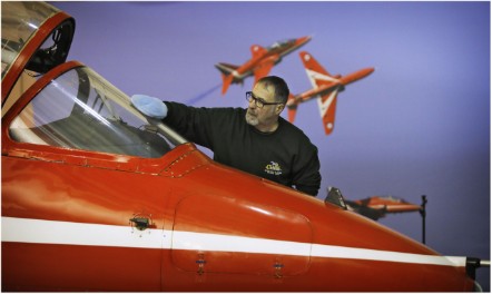 Principal Conservator, Stuart McDonald cleans a Red Arrows Hawk at the National Museum of Flight. Image (c) Paul Dodd (4)