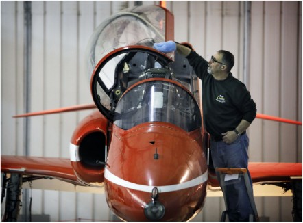 Principal Conservator, Stuart McDonald cleans a Red Arrows Hawk at the National Museum of Flight. Image (c) Paul Dodd (2)