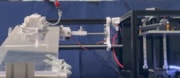 Soft robot walks off machine: Soft robot walks off the Flex Printer machine that made it