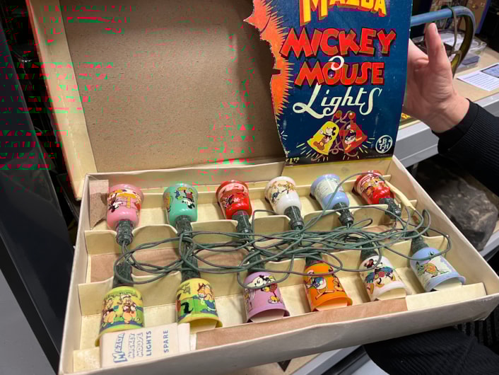 Biscuit messages: Also part of the collection is a set of Mickey Mouse Christmas tree lights as well as some brightly coloured glass baubles manufactured by Morley’s Briteglass Ltd. The Jay-Tee brand glass Christmas tree decorations were owned by local couple Herbert and Maud Storer who married in 1944.