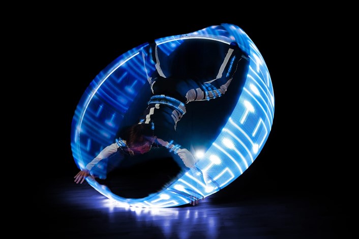Light Night 2023: At Trinity Leeds, Yorkshire Circus will present Portals, which features a one-of-a-kind acrobatic performance inside an illuminated wheel.