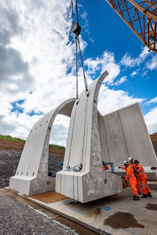 Some of the first green tunnel segments being lifted into position at Chipping Warden June 2022