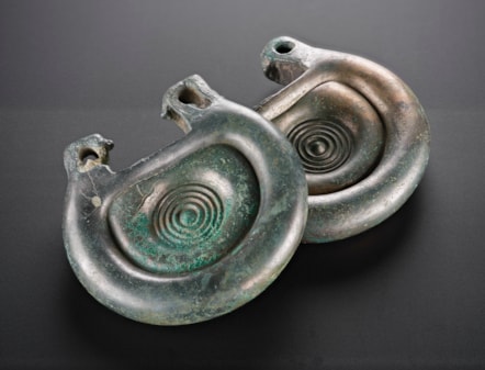 Decorated bronze fittings from the Peebles Hoard. Photo © National Museums Scotland