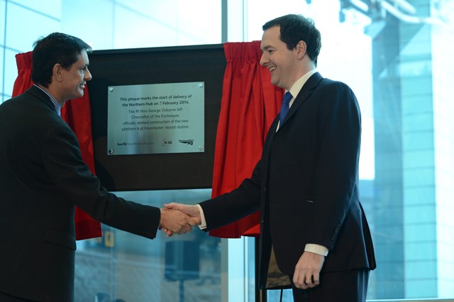 The Chancellor of the Exchequer, George Osborne MP, and Martin Frobisher, area director for Network Rail, unveil a plaque marking the start of work on the Northern Hub at Manchester Airport station