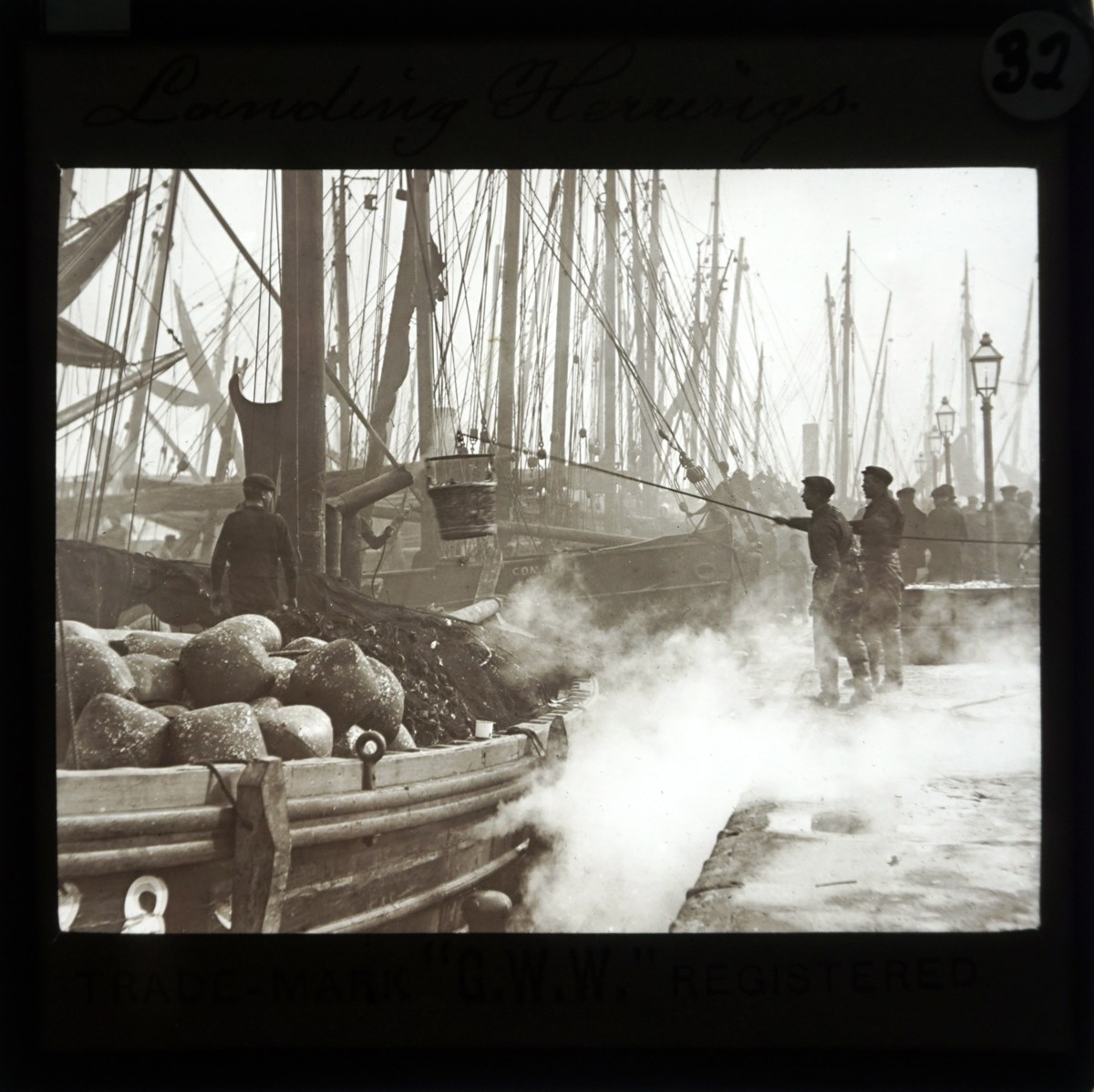 G.W. Wilson and Co.
Landing Herrings at Aberdeen, late 19th-century
Glass lantern slide
Collection: National Library of Scotland, MacKinnon Collection, acquired jointly with the National Galleries of Scotland with assistance from the National Lottery Heritage Fund, the Scottish Government and Art F