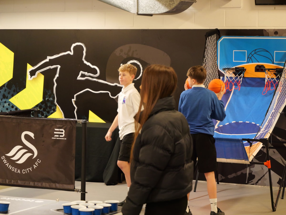 Learners playing basketball at Swansea FC