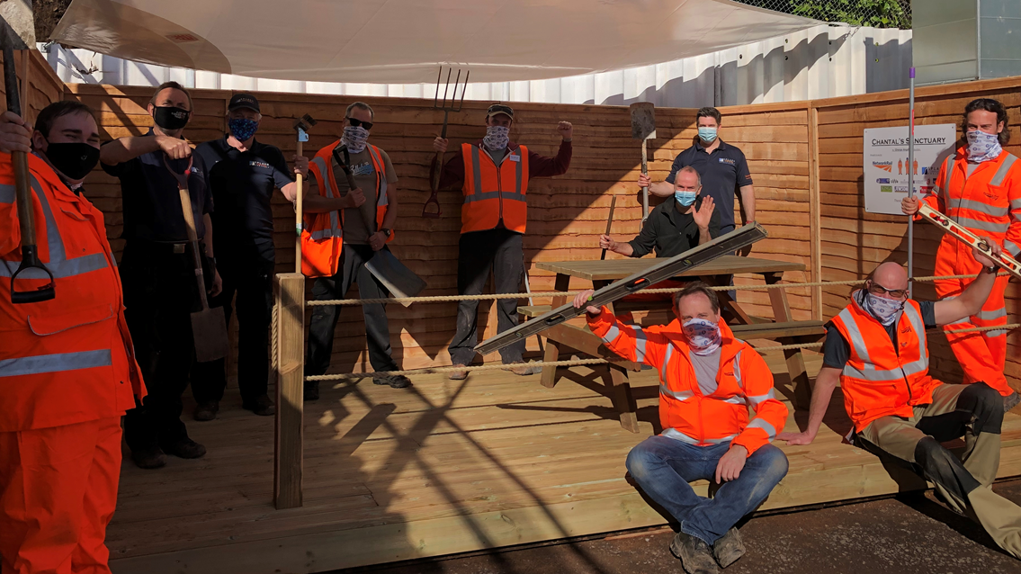 Rail industry goes green fingers to help create outdoor garden space at Nightingale Hospital Exeter: Network Rail volunteers at Exeter Nightingale Hospital