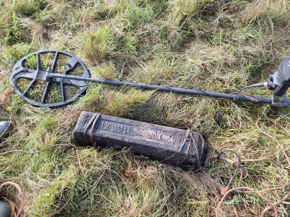 Lead pig found by  Nick Yallope and Peter Nicolas after being dug out of ground