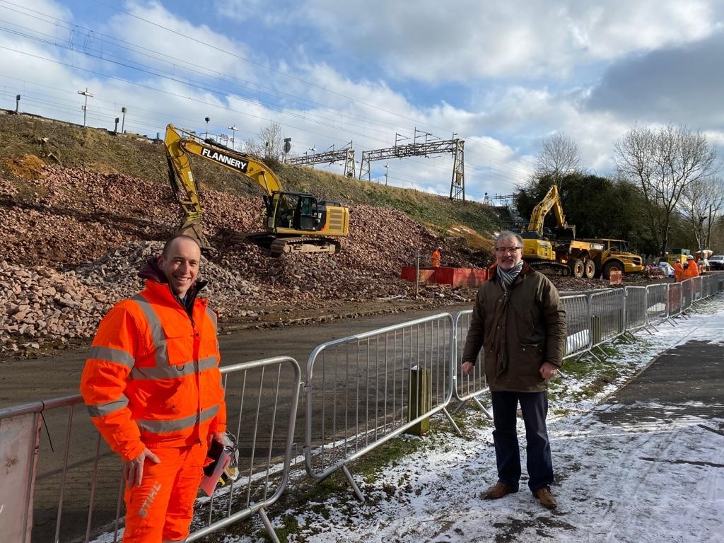 MP for Rugby Mark Pawsey with Network Rail engineer Luke Swain at Hillmorton landslip repair 11 Feb 2021
