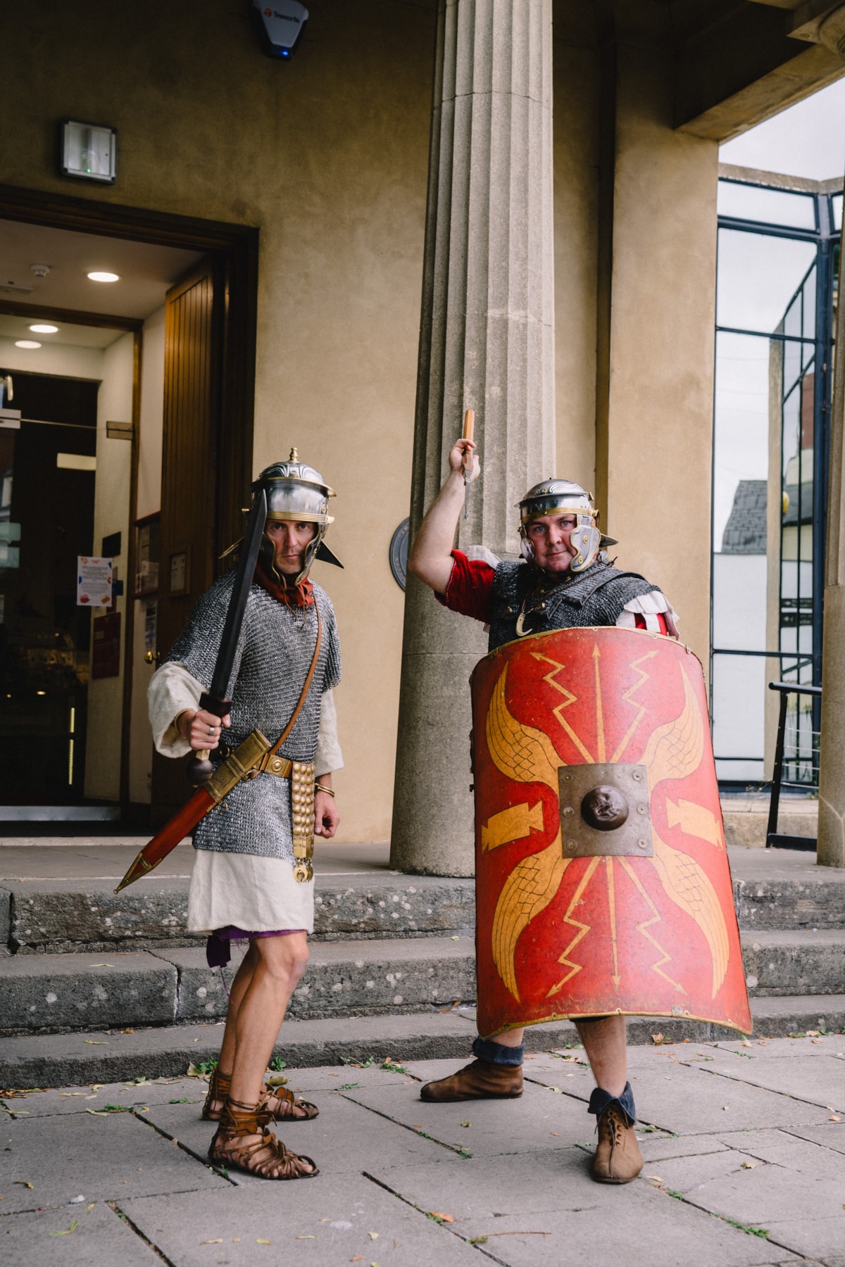 Two Roman 'soldiers' outside the National Roman Legion Museum in Caerleon.