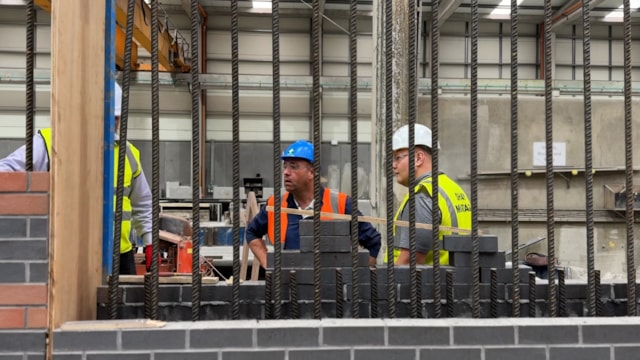 Brickwork being laid on new Greek Street bridge parapets inside Shay Murtagh factory in Ireland: Brickwork being laid on new Greek Street bridge parapets inside Shay Murtagh factory in Ireland