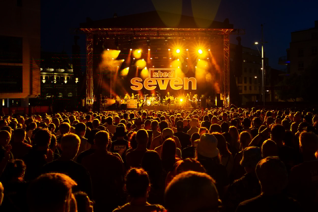 ShedSeven 25 @Mark Ratcliffe (1): Shed Seven stage and crowd shot from Millennium Square, Leeds (mandatory image credit for Mark Ratcliffe)