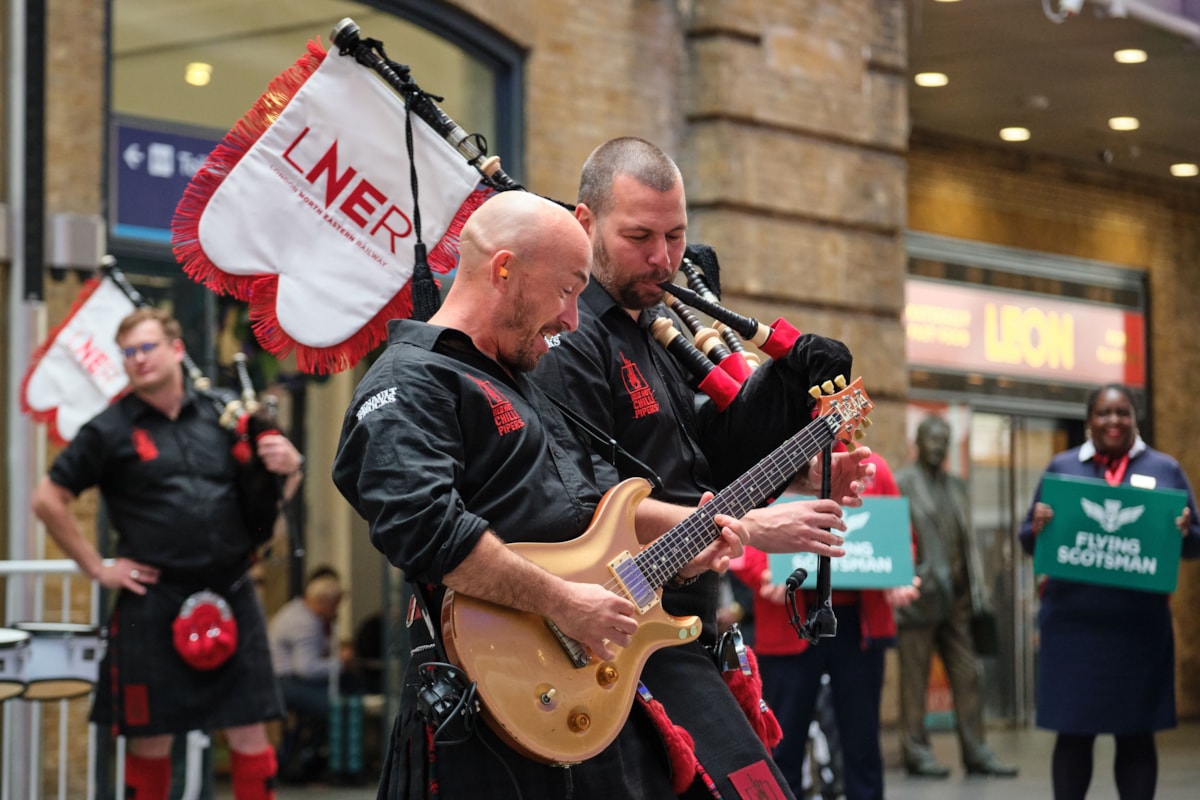 LNER RED HOT CHILLI PIPERS PERFORMING AT KGX