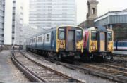 Original British Rail livery on a Class 455: Class 455 units 455-919 (left, in British Rail livery) and 455-868 (right, in Network Southeast livery) at Waterloo sidings on 4 March 1989. 455-868 has now been repainted in a livery similar to 455-919.
Credit: Alan Paterson.