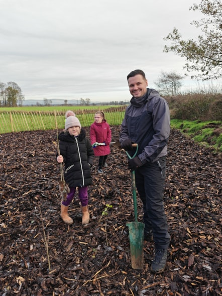 Councillor Joshua Roberts joined schoolchildren planting trees