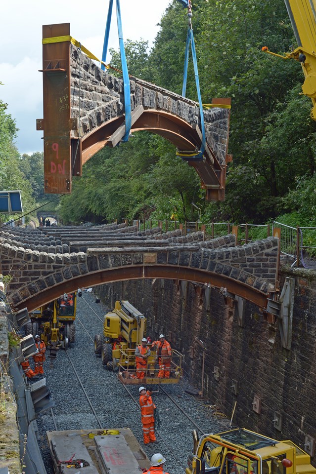 Engineers install the refurbished Chorley Flying Arches