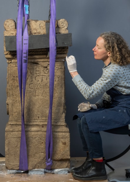 Conservator Diana de Bellaigue works on the Roman altar. Photo © Phil Wilkinson (4)